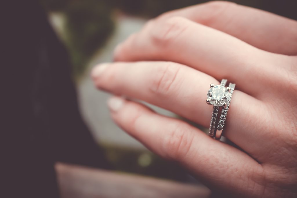 hand with diamond ring