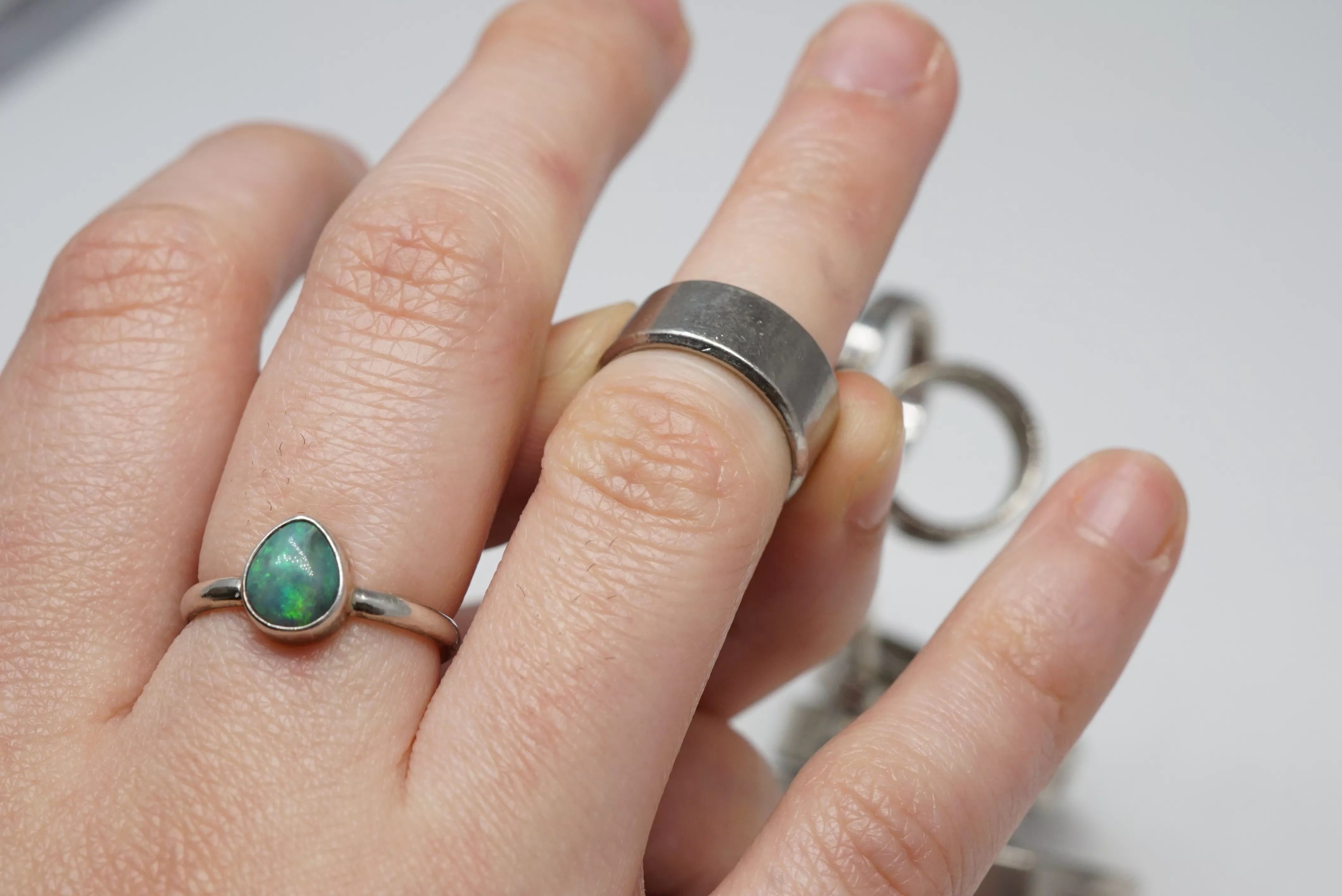 My ring is too big for my finger so it slides around but if I size it  smaller, it won't fit over my knuckle. What do I do? - Quora