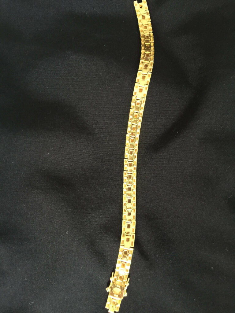 a gold bracelet 