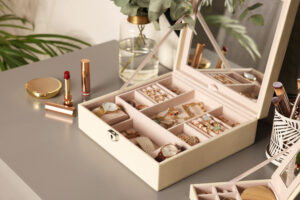 jewelry-box-with-jewelry-next-to-cosmetics