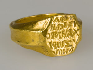 gold-signet-ring-writing