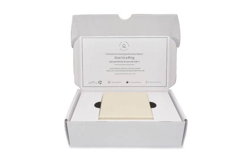 Open QJR return mailer with the jewelry box fitted inside